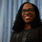 Judge Ketanji Brown Jackson in front of a blue background