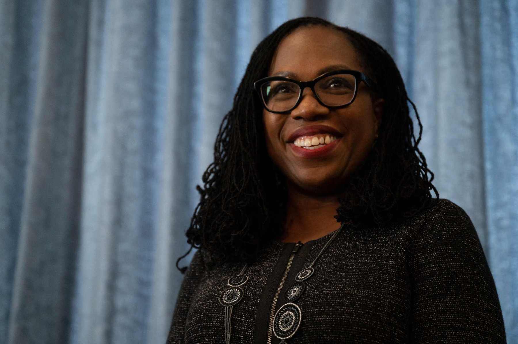 Judge Ketanji Brown Jackson in front of a blue background