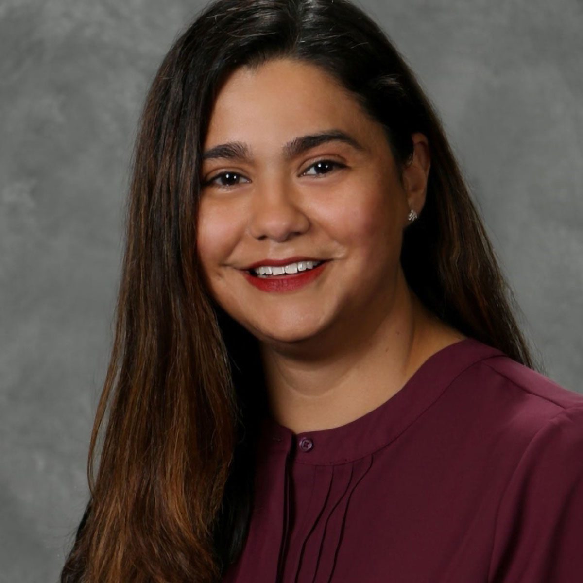 Smiling headshot of Alexa Garza