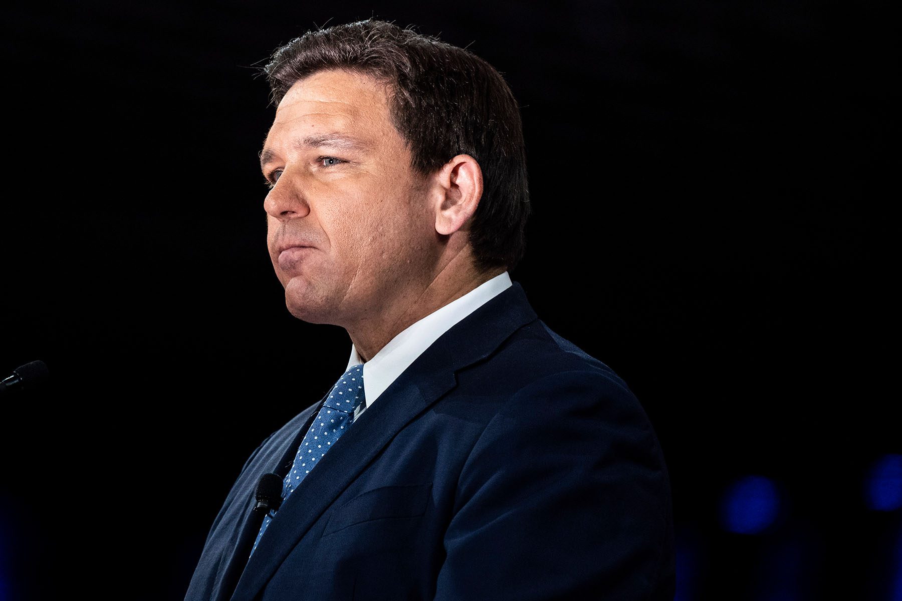 Ron DeSantis looks solemn on stage at the Conservative Political Action Conference.