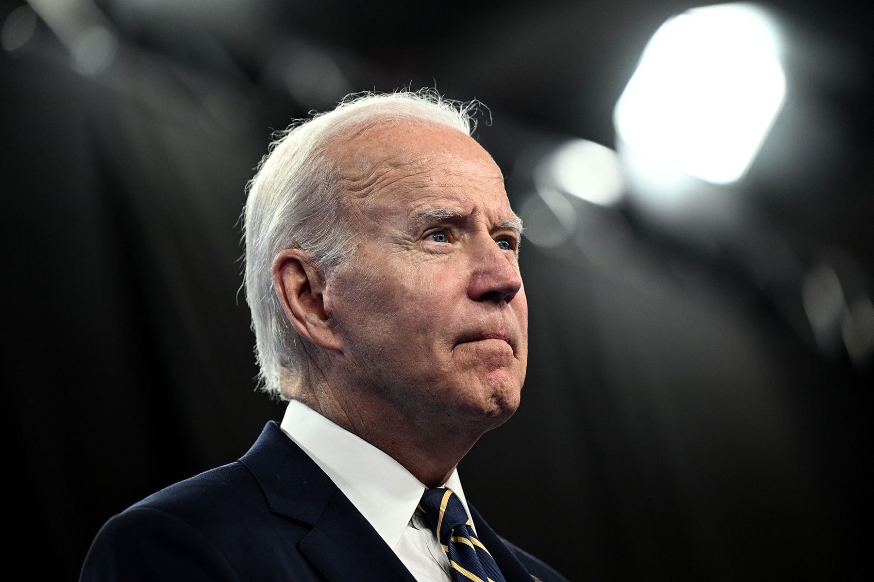 President Joe Biden addresses media representatives during a press conference.