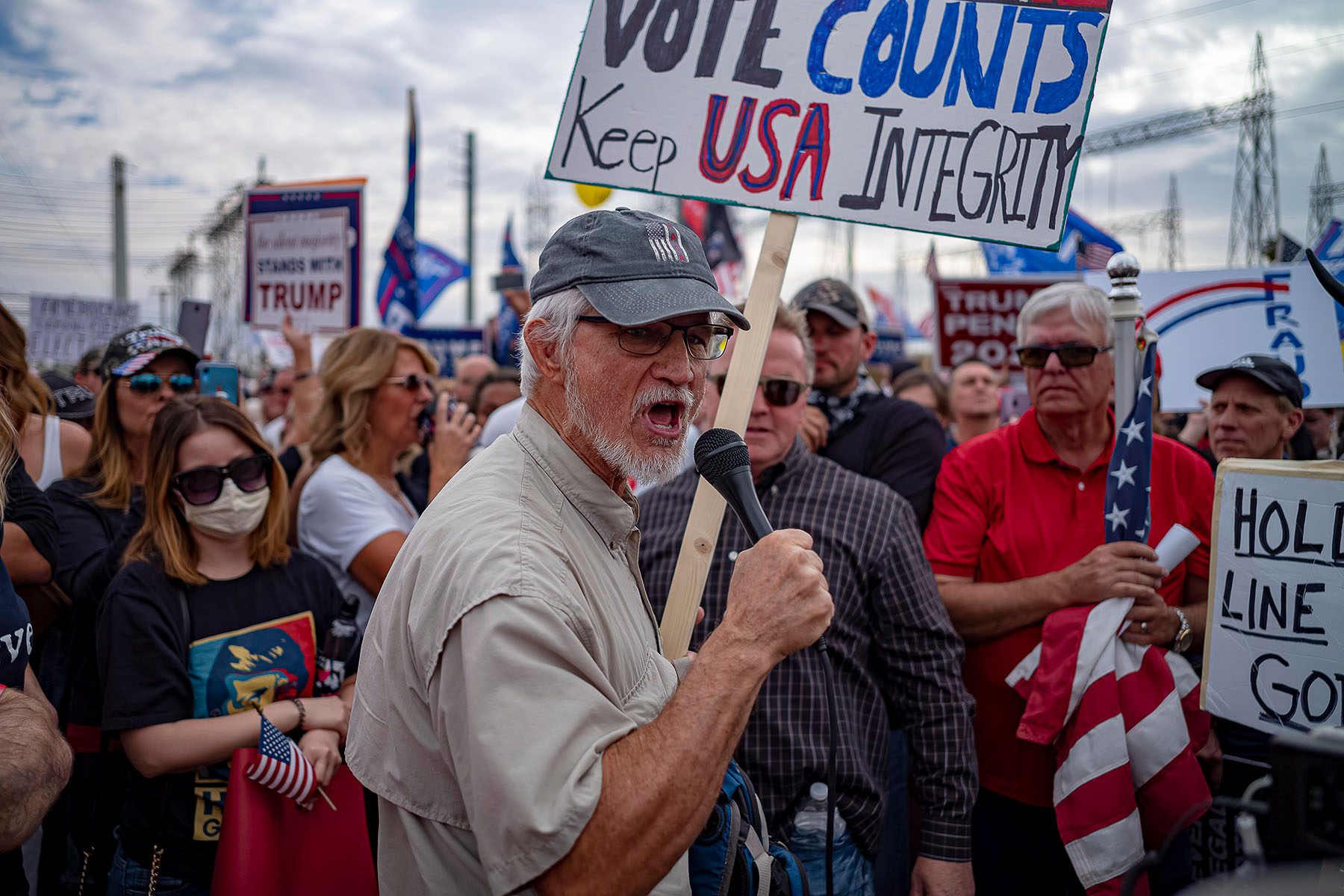 Donald Trump supporters protest in front of the Maricopa County Election Department while votes are being counted.