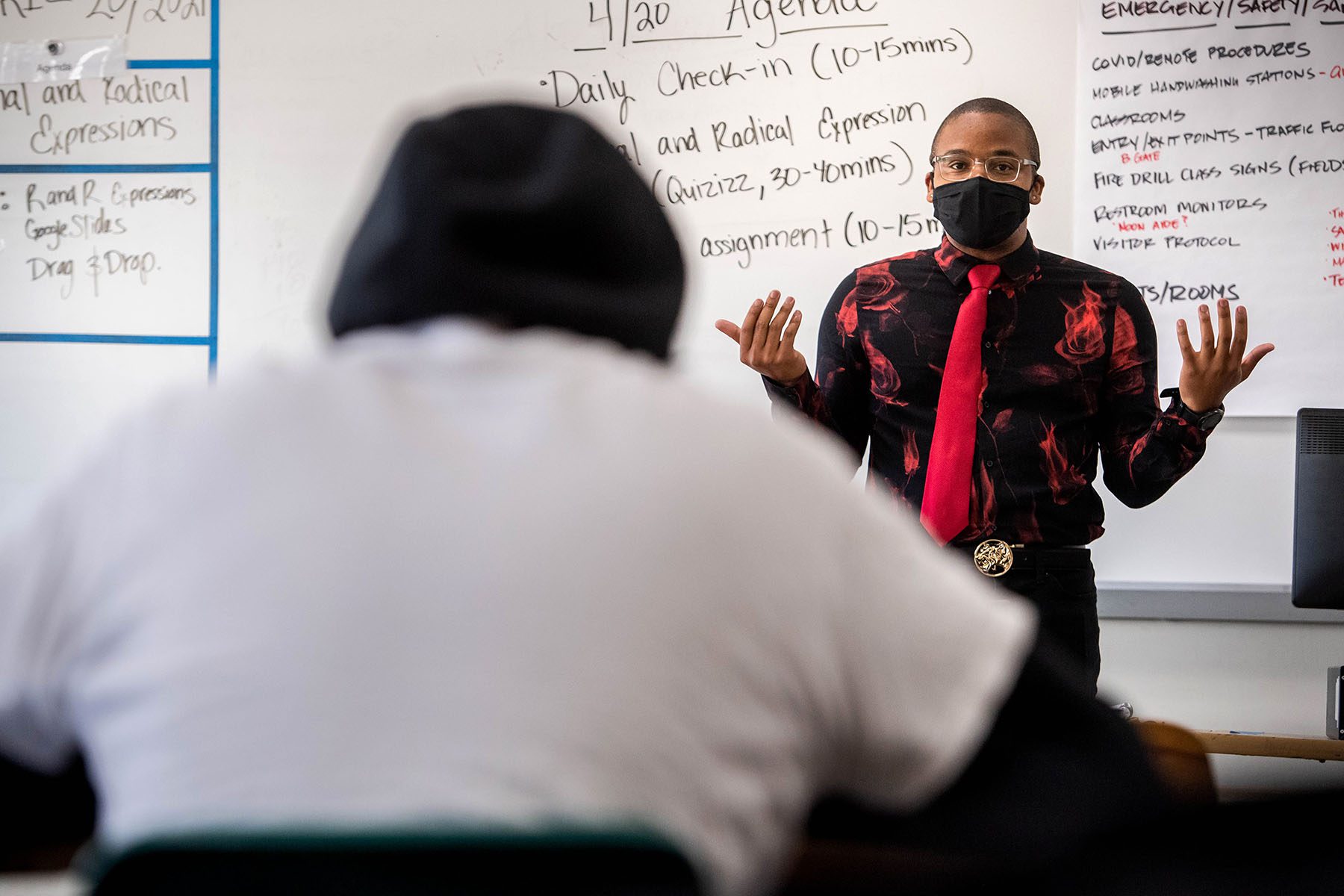 A math teacher speaks to his class at Pasadena High School.