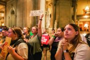 Abortion rights activists react after the Indiana Senate votes to enact a near total abortion ban.