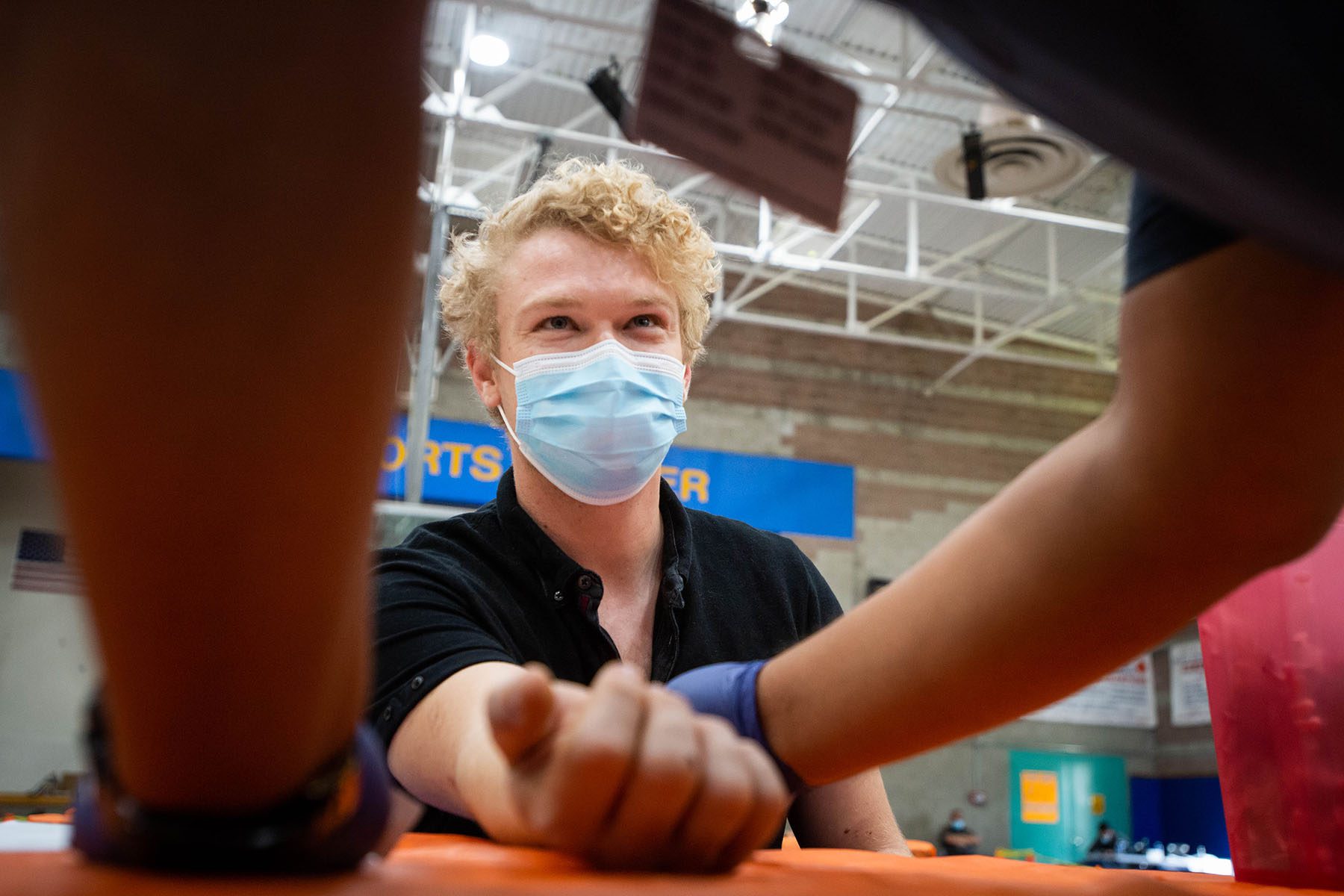 A person gets their monkeypox vaccine at a vaccination site in California.