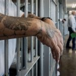 A close-up of a prisoner's hands at Angola Prison.