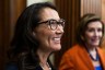 Mary Peltola smiles as she participates in a swearing-in ceremony with Speaker of the House Nancy Pelosi.