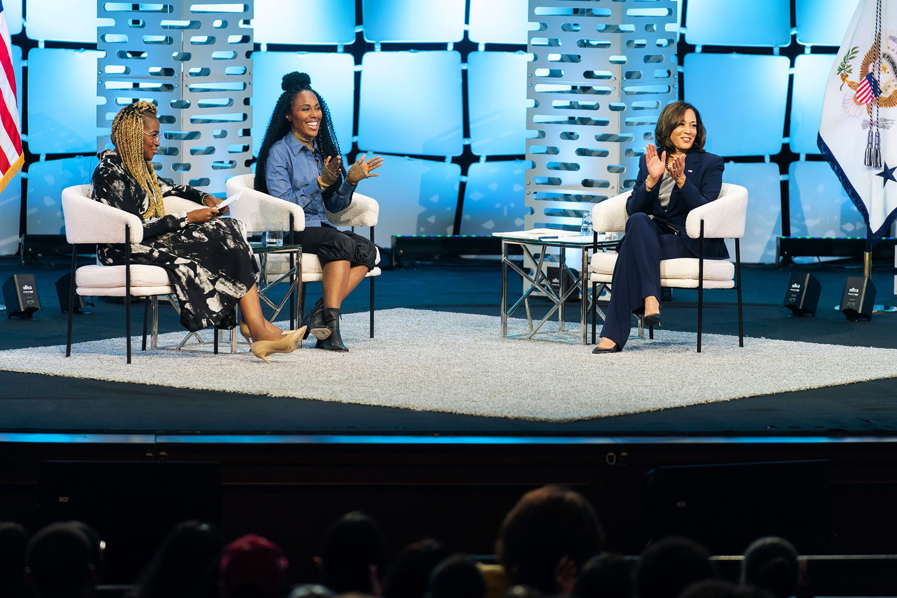 Kamala Harris is seen on stage during a conversation on reproductive choice with DeWanda Wise and Errin Haines