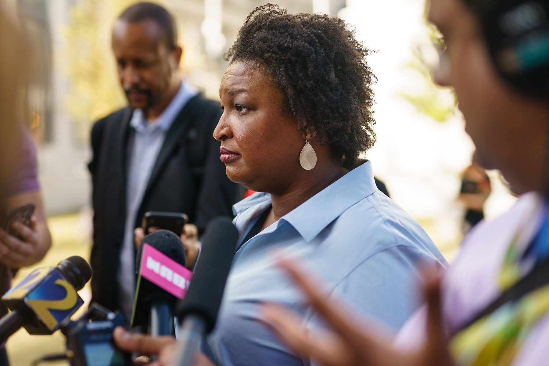 Stacey Abrams speaks to the media after an event at Georgia State University