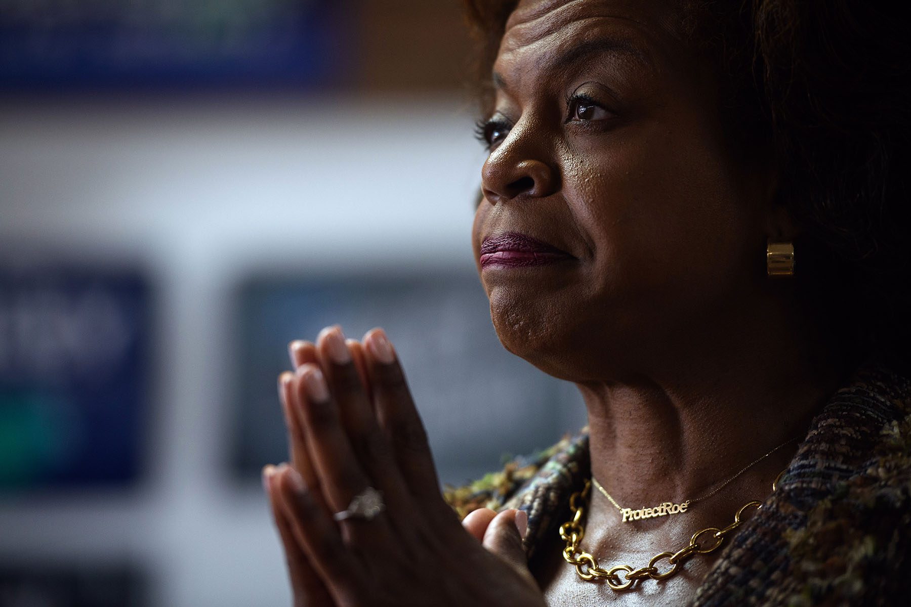 Cheri Beasley listens to constituents during a campaign event.