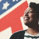 A photo-illustration shows Jennifer-Ruth Green, Republican candidate for Indiana's 1st Congressional District, in front of the symbol of the Republic Party.