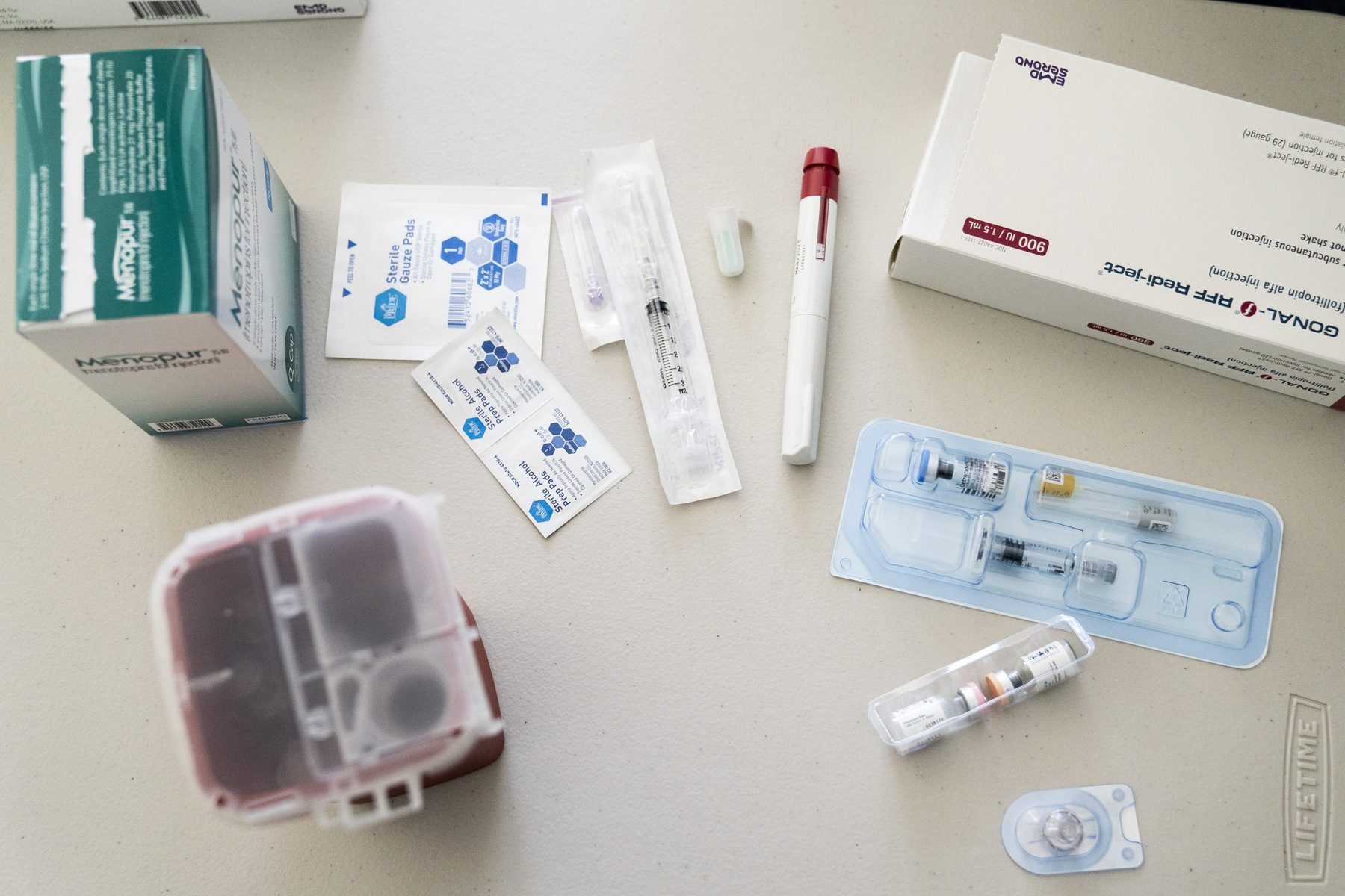 Medication for fertility treatment on a table.