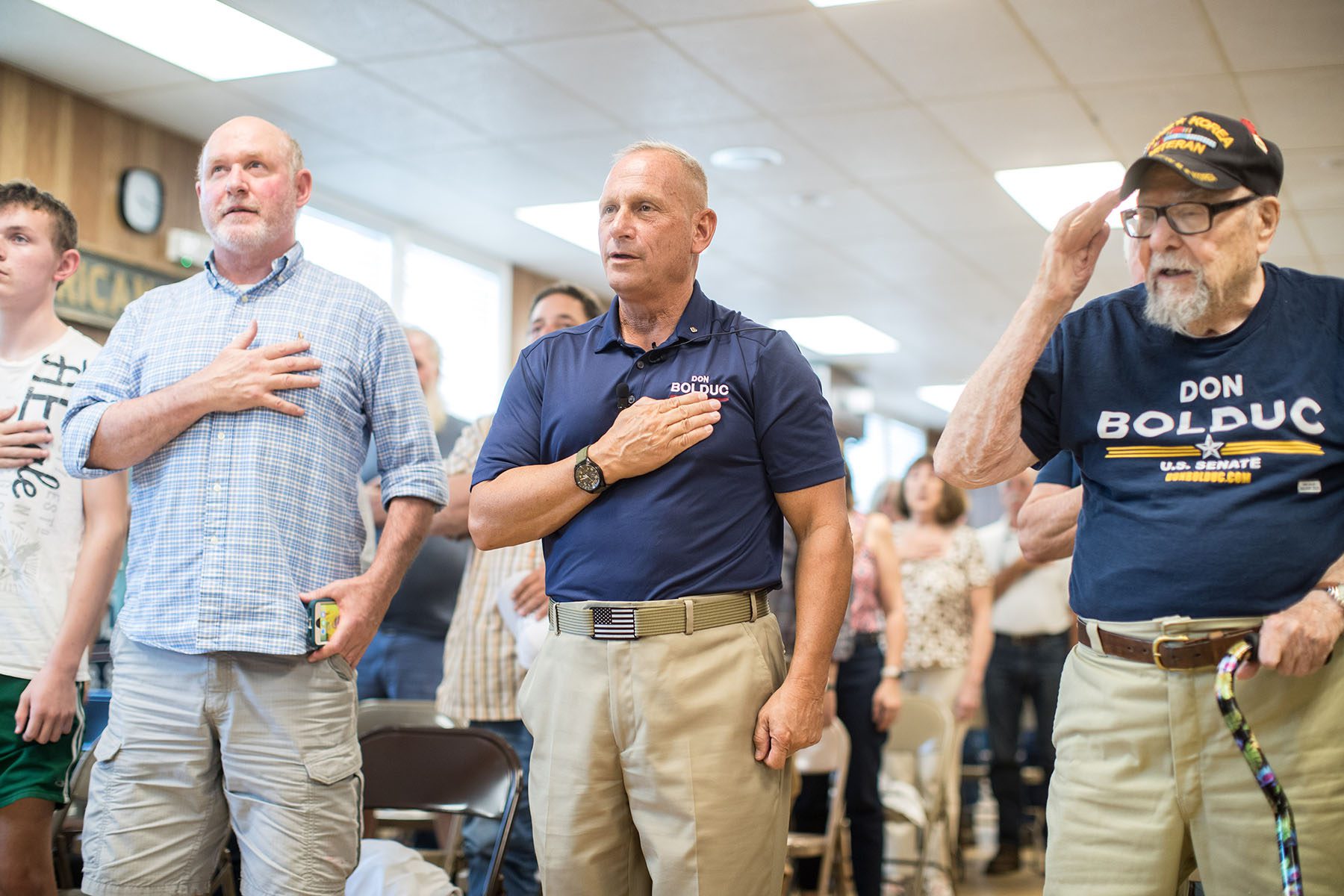 Don Bolduc with supporters at a town hall event during the Pledge of Allegiance