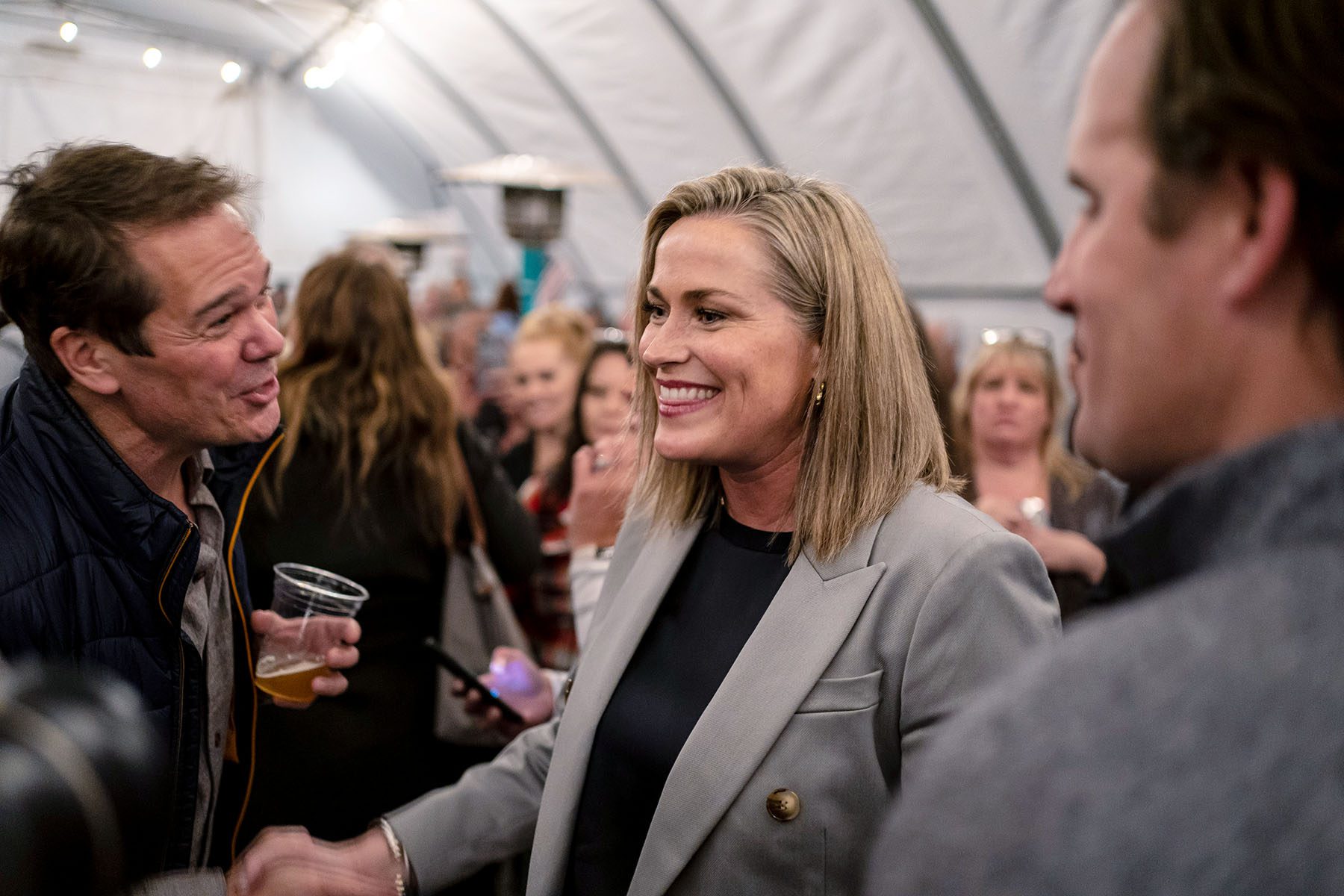 Tiffany Smiley speaks with supporters during a campaign event.