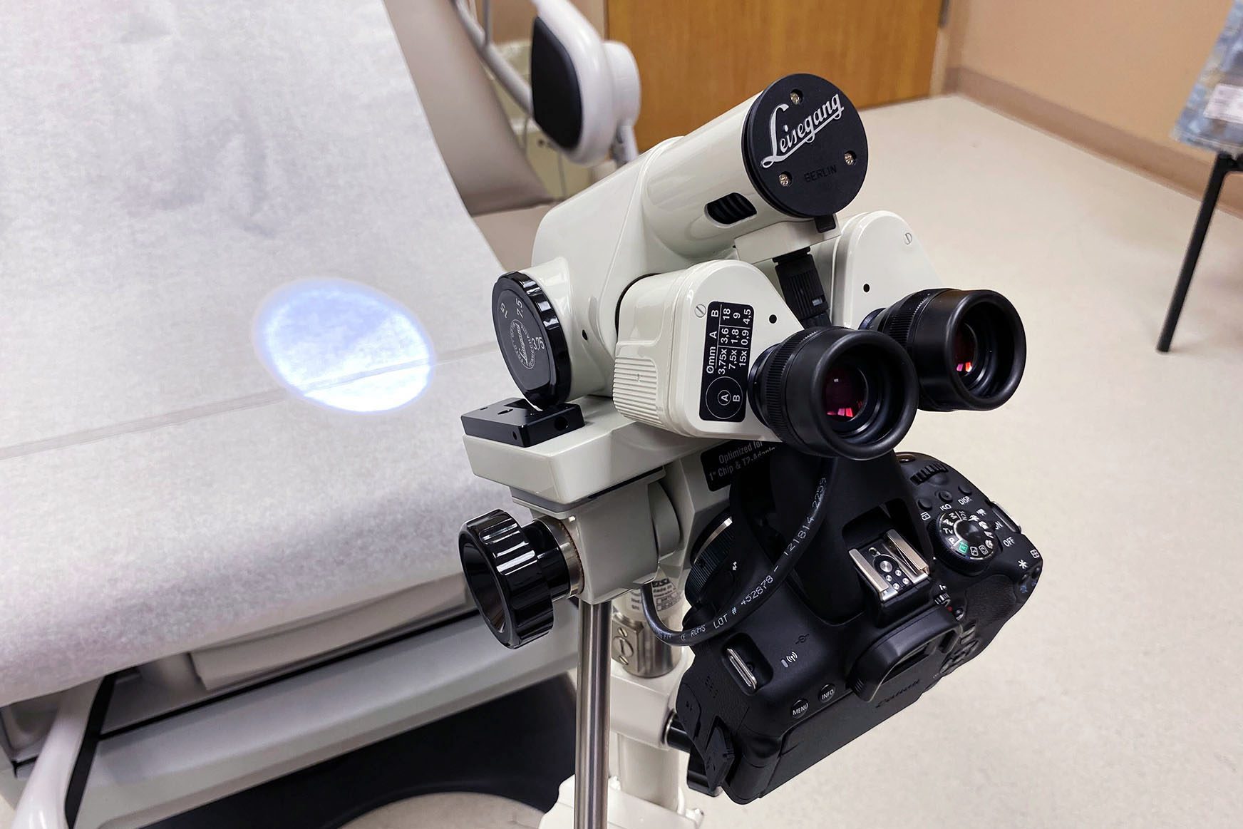 A colposcope device in an examination room.