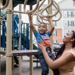 Sarah Turner and her son, Noah, play together at a park.