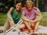 Barbara Goldstein and Ann Willoughby hug each other as they pose for a pictures during their first summer together.