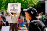 A woman supporting abortion rights reacts to an anti-abortion protest outside the South Carolina Statehouse.