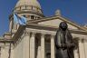 A statue in front of the Oklahoma State Capitol building.