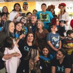 New Mexico Gov. Michelle Lujan Grisham and Albuquerque Mayor Tim Keller pose for selfies with attendees.