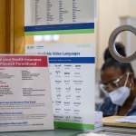 Signs at a reception window at a Planned Parenthood