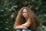 Sage Lenier poses for a portrait in a jungle in Honolulu, Hawaii