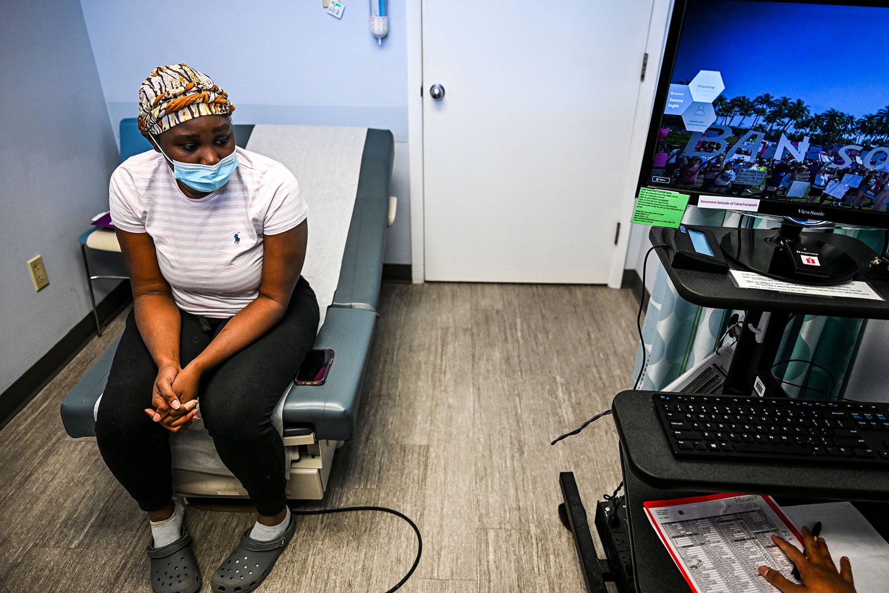 A woman waits for an abortion consultation at a Planned Parenthood Clinic in Jacksonville, Florida.