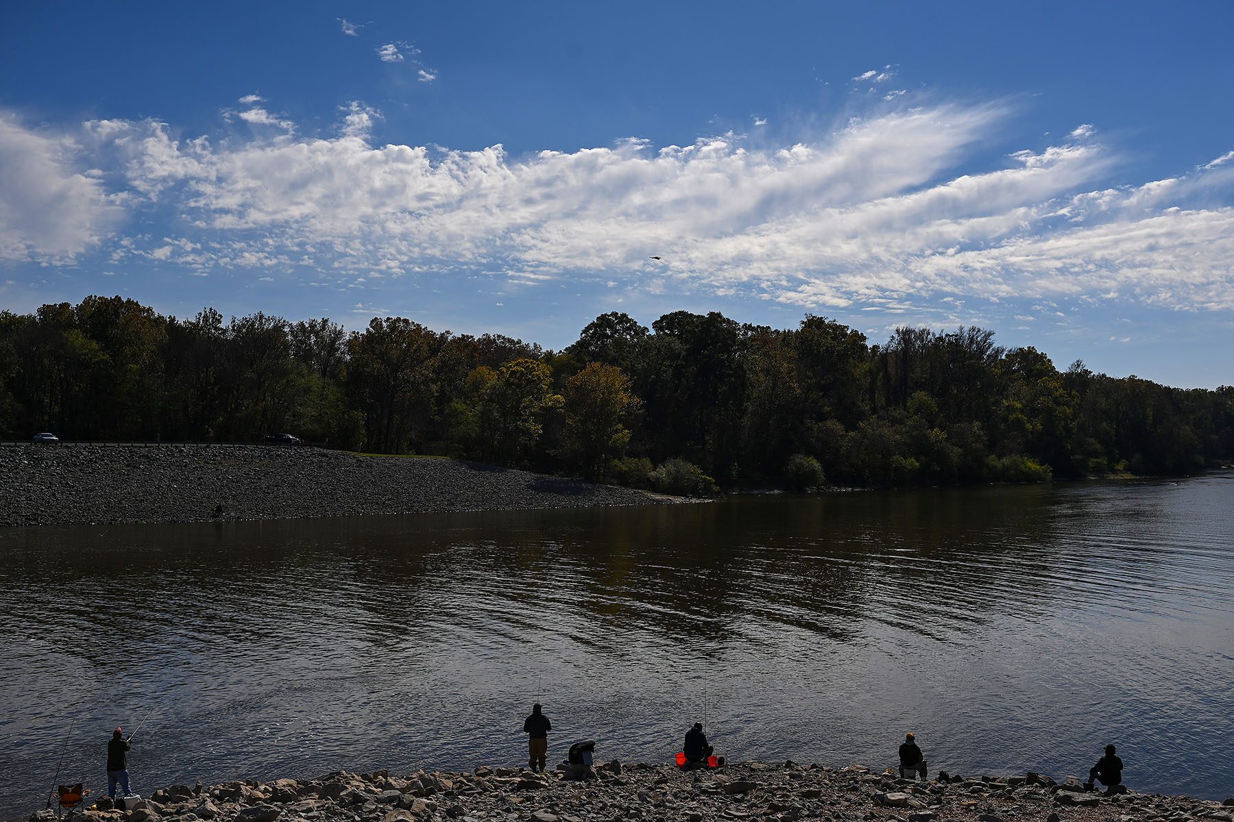 People fish along the Pearl River.