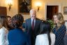 President Joe Biden greets panelists at the SBA Women’s Business Summit at the White House.