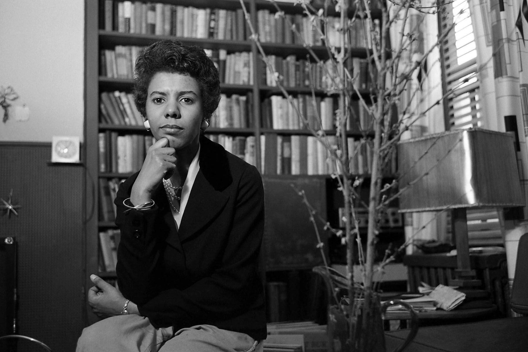 Writer and playwright Lorraine Hansberry poses for a portrait in her apartment in April 1959 in New York City.