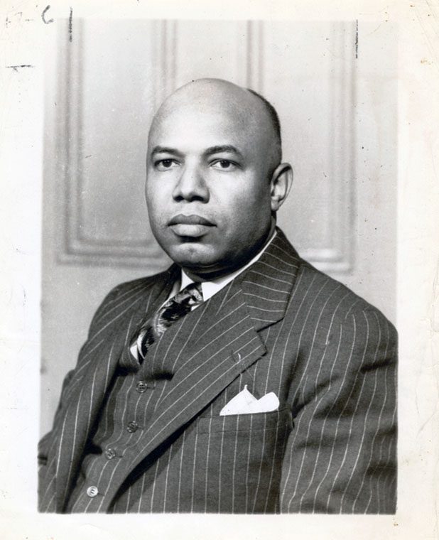 A portrait of Carl Augustus Hansberry wearing a 3 piece suit.