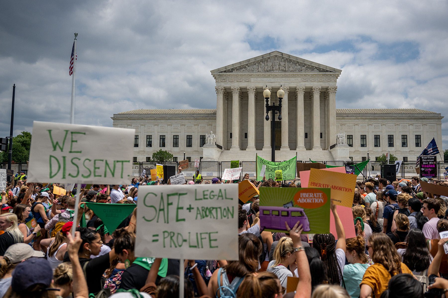 People protest in response to the Dobbs v Jackson Women's Health Organization ruling in front of the Supreme Court.