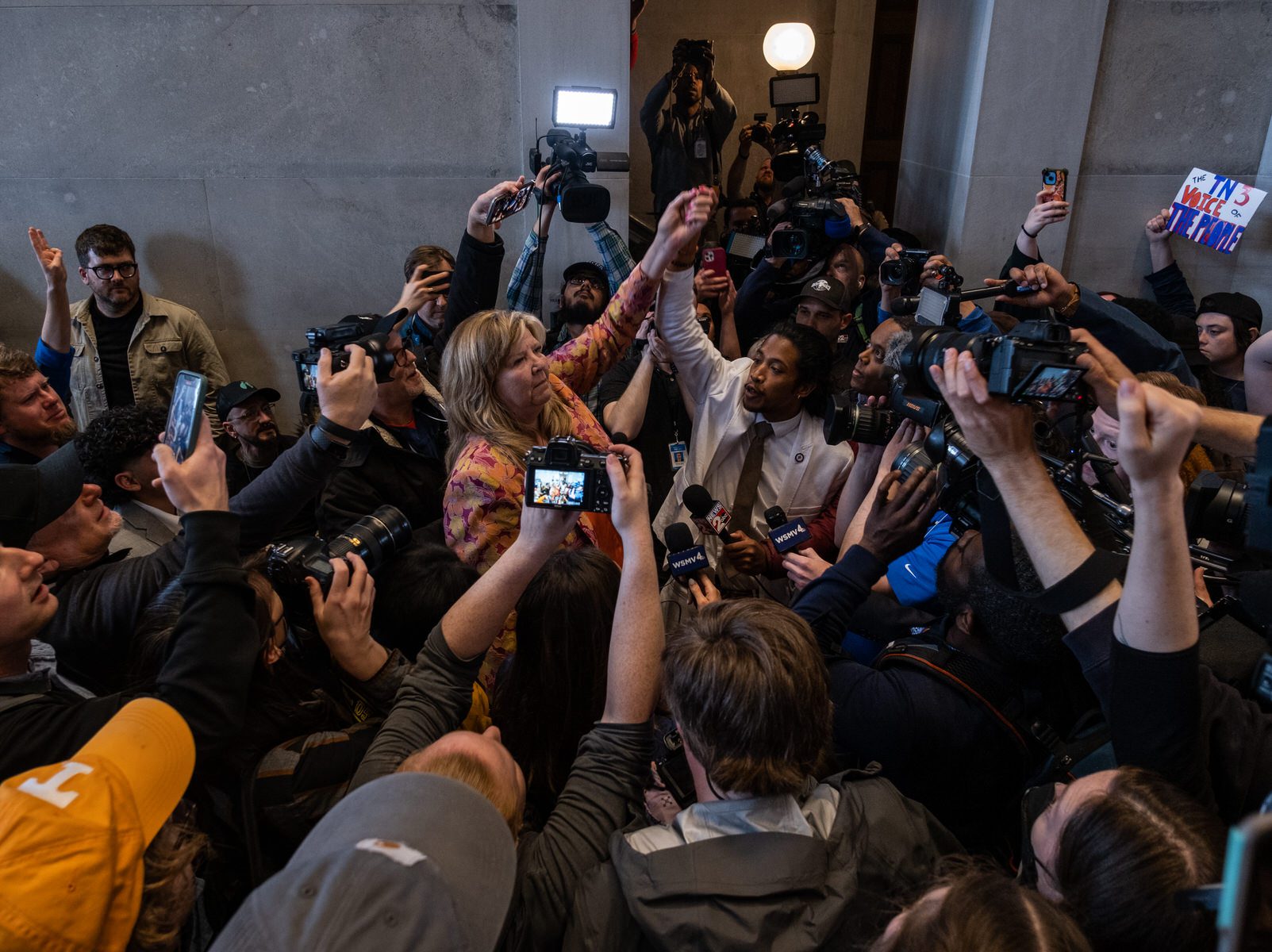 Reporters surround Reps. Gloria Johnson and Justin Jones in the Tennessee Capitol