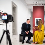 Doug Emhoff laughs as he speaks with 19th editor-at-large Errin Haines at the National Portrait Gallery in Washington, D.C.