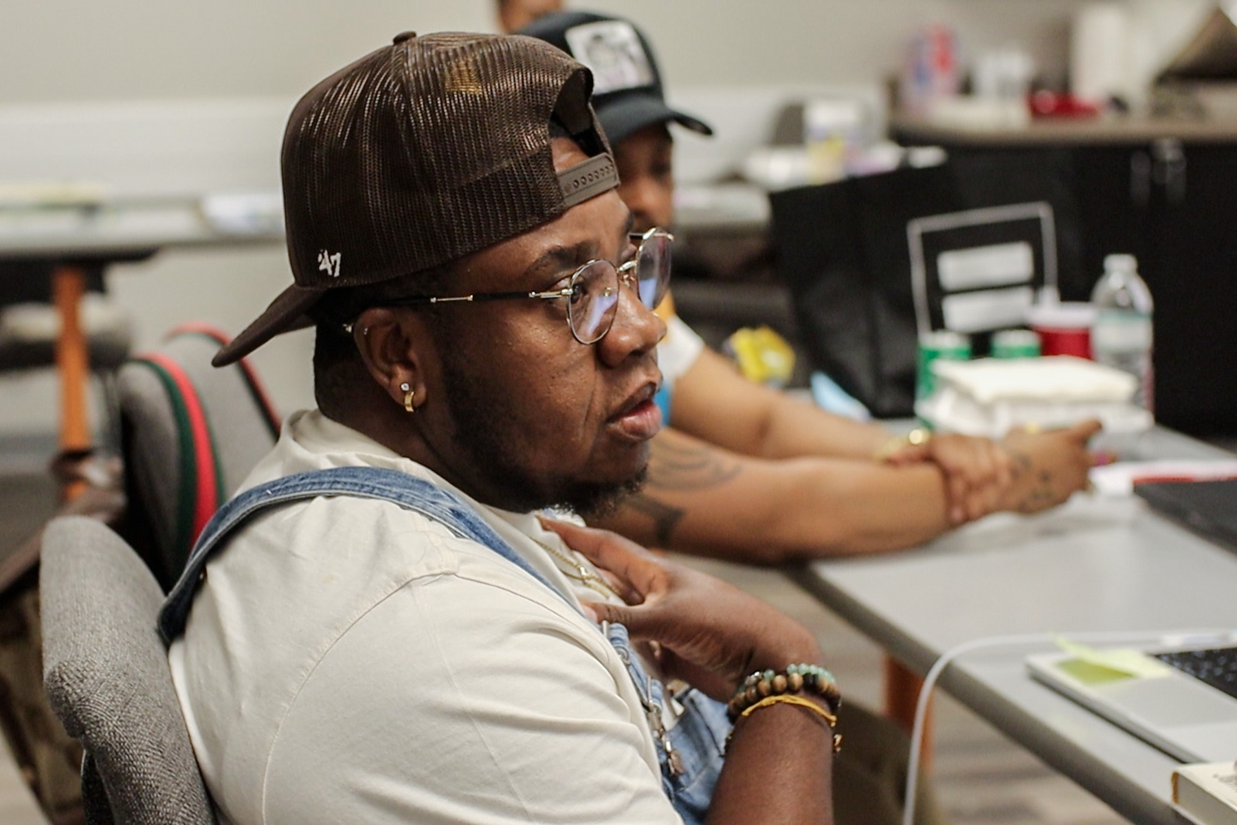 Brayland Brown speaks as others listen during the workshop.