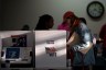 People vote at a polling location in Columbus, Ohio on November 8, 2022.