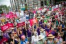 Abortion rights supporters watch North Carolina Gov. Roy Cooper sign a veto against the law that bans abortion after 1st trimester.