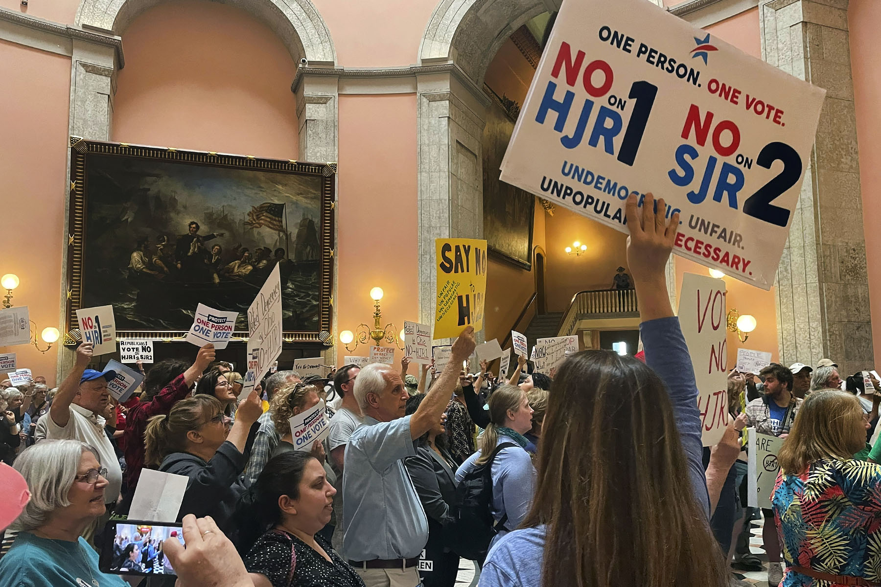 Supporters and opponents of a GOP-backed measure that would make it harder to amend the Ohio constitution packed the statehouse rotunda on May 10, 2023, in Columbus, Ohio. At stake is a citizen-led amendment to grant abortion access in Ohio.