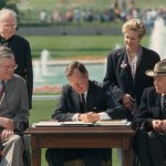 George Bush signs the Americans with Disabilities Act in Washington D.C., in July 1990.