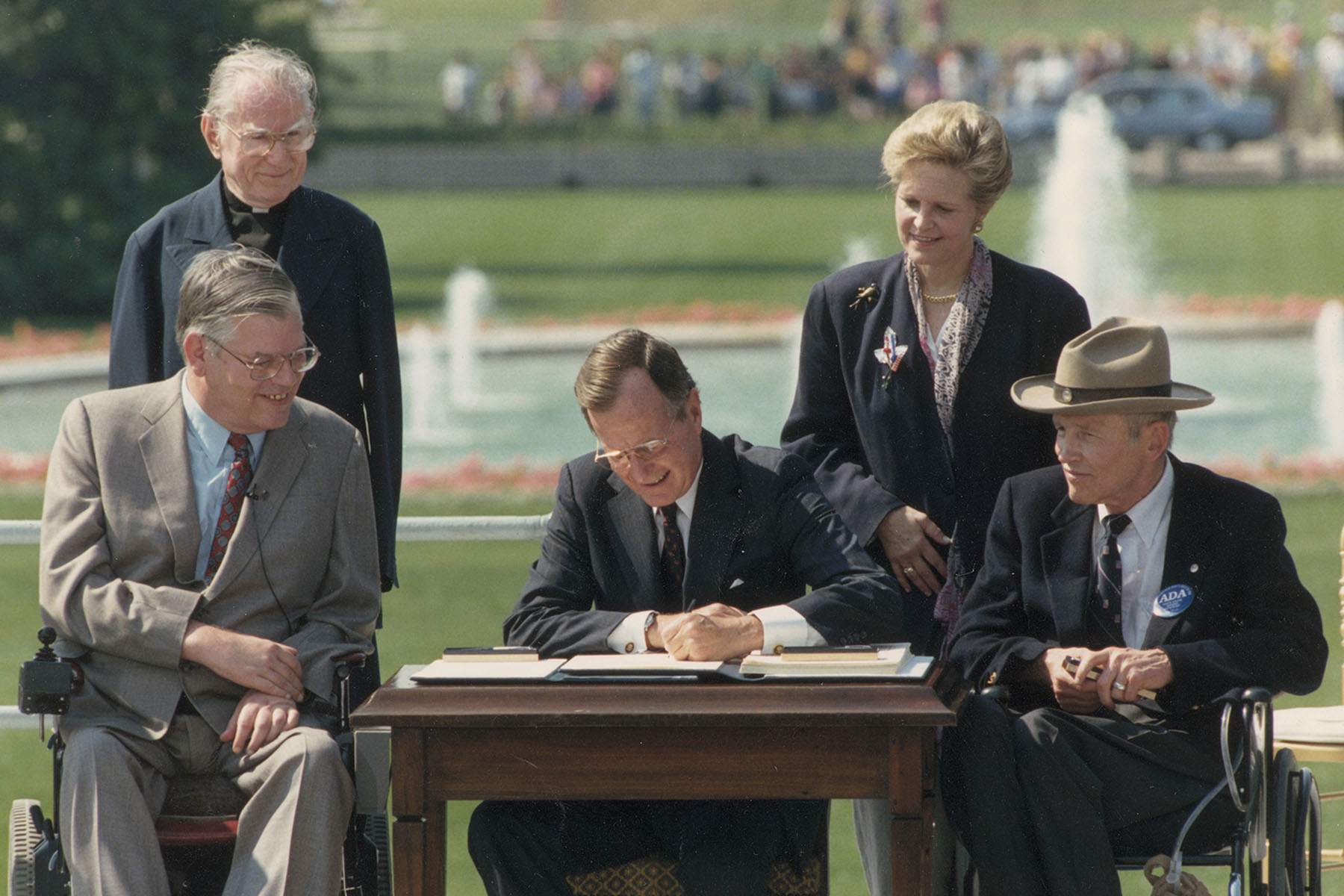 George Bush signs the Americans with Disabilities Act in Washington D.C., in July 1990.