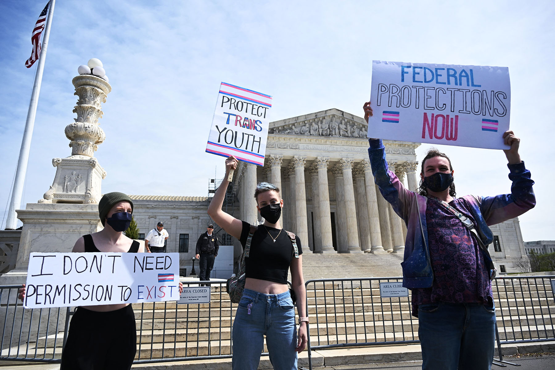 Activists for transgender rights gather in front of the Supreme Court