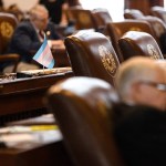 A transgender pride flag sits on the desk of Texas lawmakers.