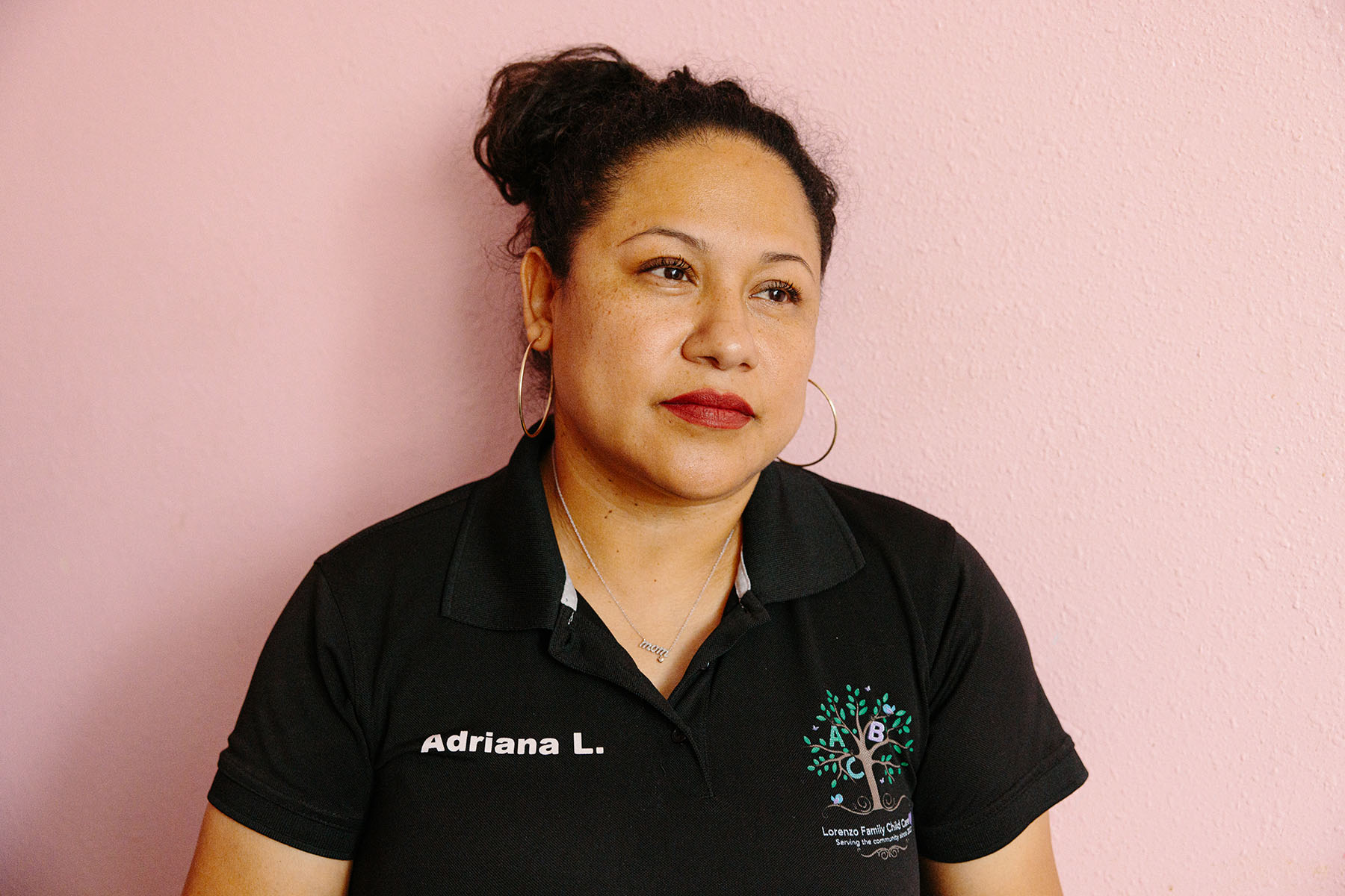 Adriana Lorenzo poses for a portrait at her home based daycare, The Lorenzo Family Child Care.