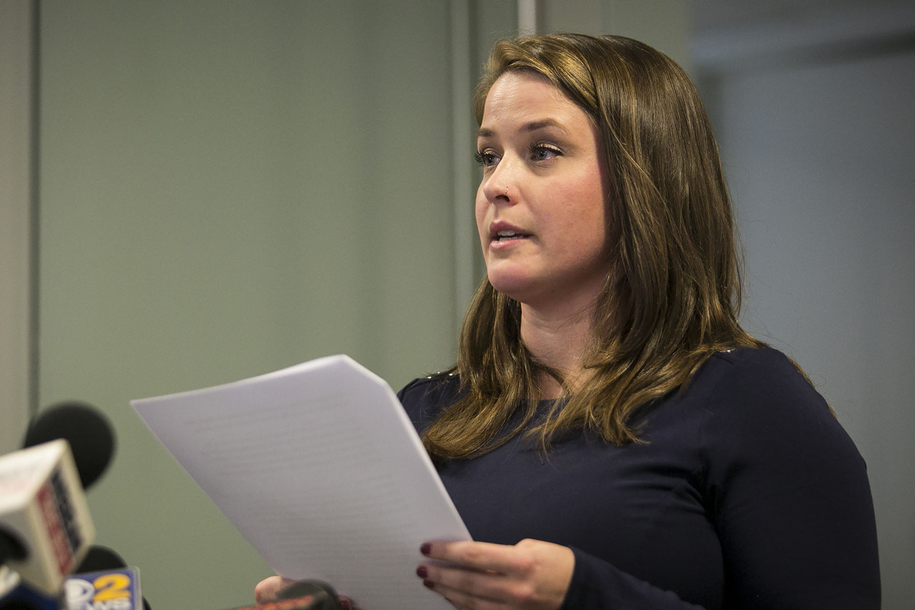 Alaina Hampton speaks during a news conference.