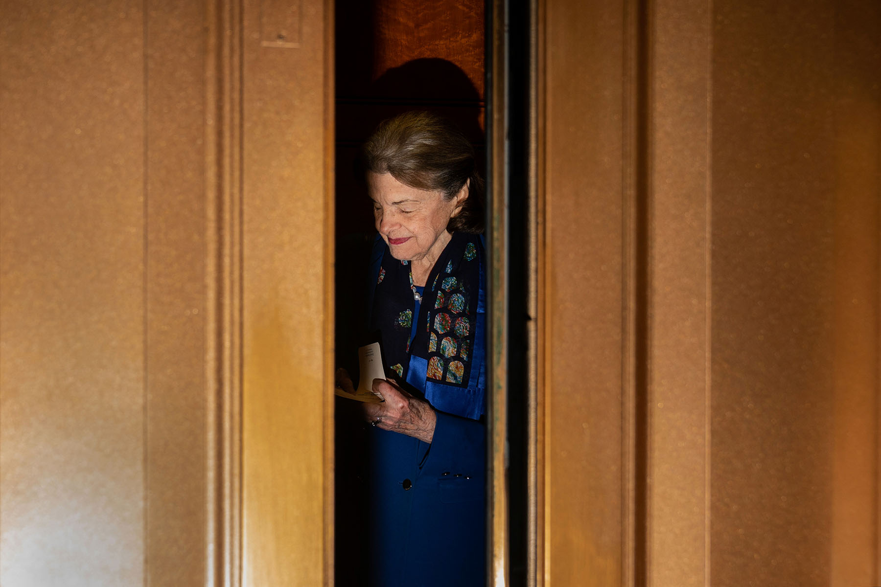 Sen. Dianne Feinstein leaves the Senate Chamber following a vote at the Capitol.