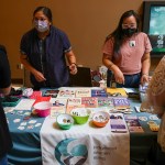 Sandy Harris (left) and Jonnette Paddy (right) with Indigenous Women Rising talk about abortion care and reproductive health with attendees at the “Women Are Sacred” conference.