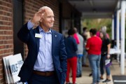 Democratic candidate for Pennsylvania Supreme Court Daniel McCaffery waves while wearing a navy blue suit.