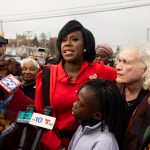 Cherelle Parker speaks to the media with her high school English teacher Janette Jimenez by her side.