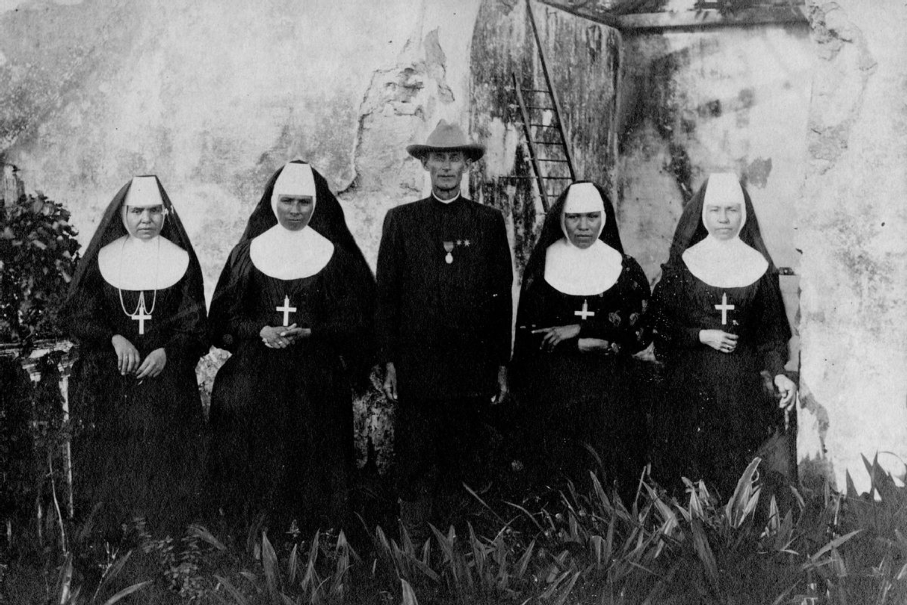 Father Craft and four members of the Congregation of American Sisters at Pinar del Rio, Cuba, about 1899. Left to right: Annie Pleets (Sister Mary Bridget), Ellen Clark (Sister Mary Gertrude), Father Francis M. Craft, Josephine Two Bears (Sister Mary Joseph), and Susie Bordeaux (Mother Mary Anthony).