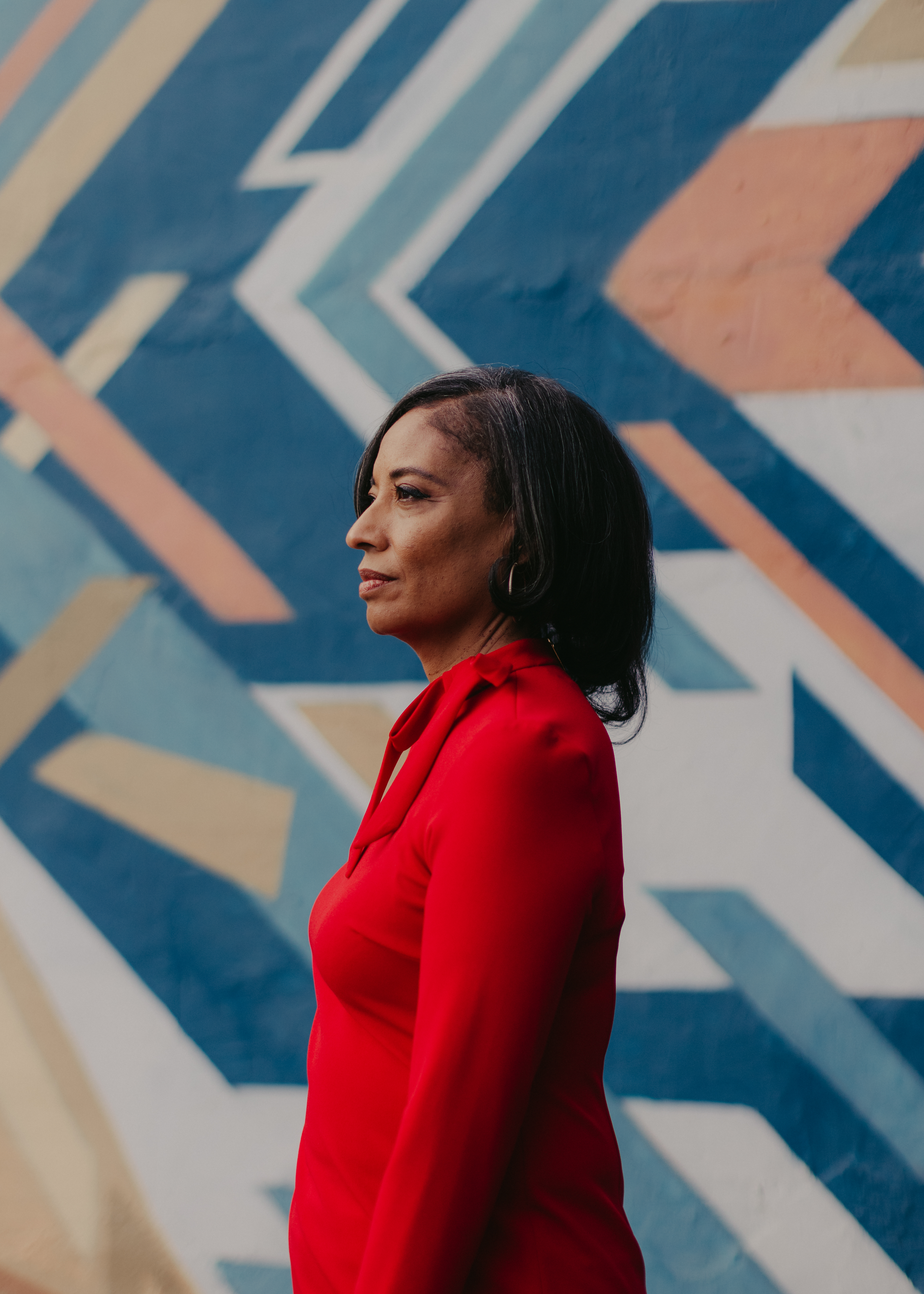 Lisa Calderón, a former member of Emerge Colorado, poses for a portrait outside of her Denver office space.